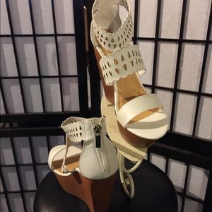 White and Brown platforms. Brand new never worn.